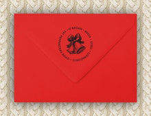 Bow Personalized Self-inking Round Return Address Stamp on Envelope