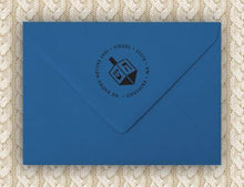 Dreidel Personalized Self-inking Round Return Address Stamp on Envelope